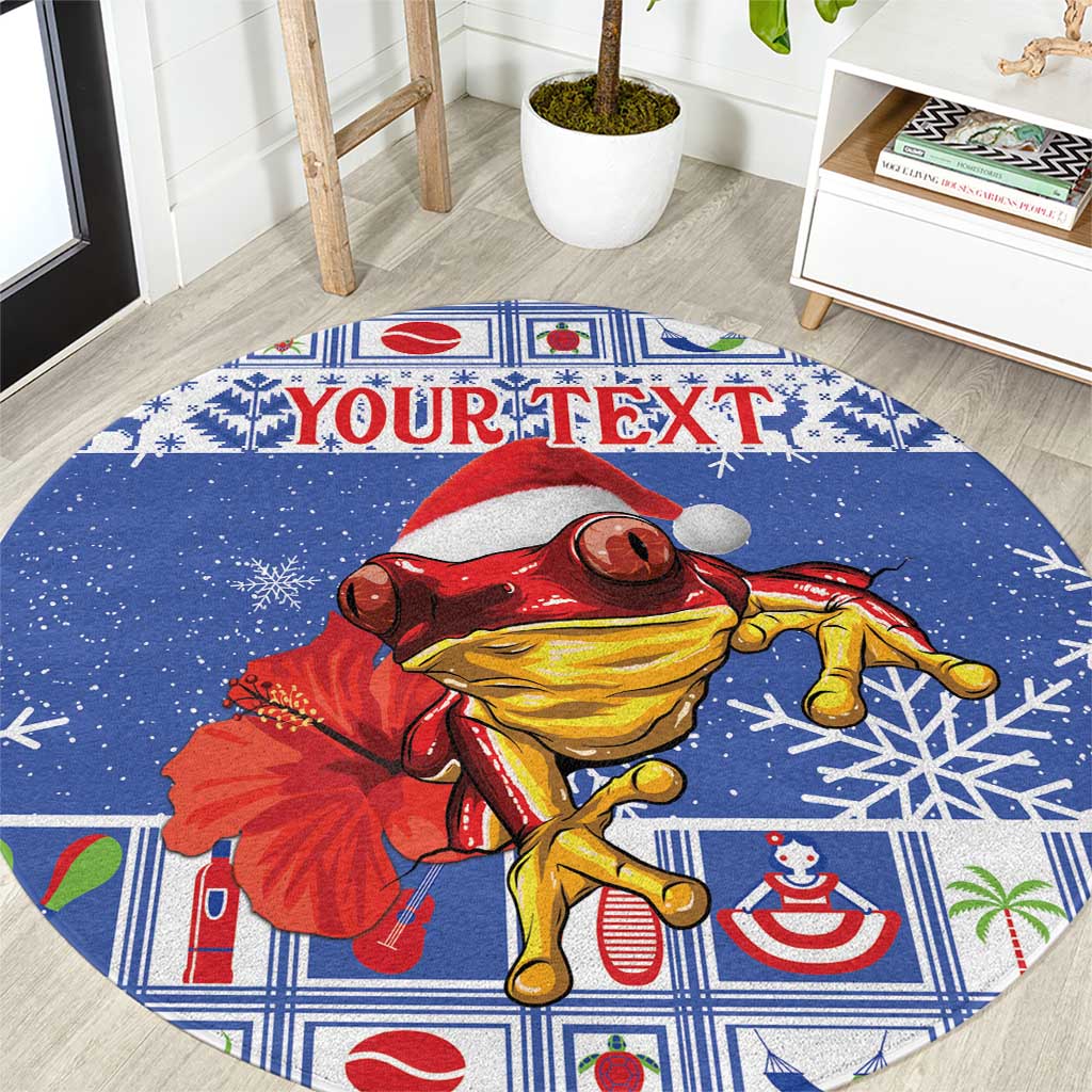 Personalized round Christmas rug in blue with coqui frog, snowflakes, and custom text