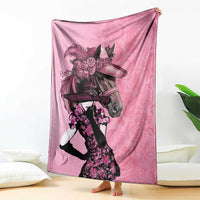 Pink throw blanket featuring a horse and derby rider with roses graphic