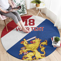 Round red, white, blue carpet with 18, custom text, and gold lion crest