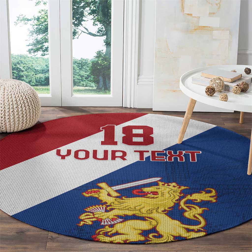 Round red, white, blue carpet with '13 YOUR TEXT' and gold lion crest