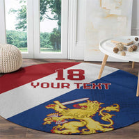 Round red, white, blue carpet with '13 YOUR TEXT' and gold lion crest