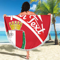 Red round beach blanket with Malta coat of arms and 'You're next' lettering, fringed border