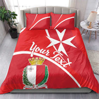 Red duvet and pillows featuring Malta coat of arms, large white cross, and personalized script