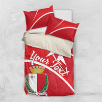 Red duvet cover and pillowcases with Malta coat of arms and white cross-and-ring design