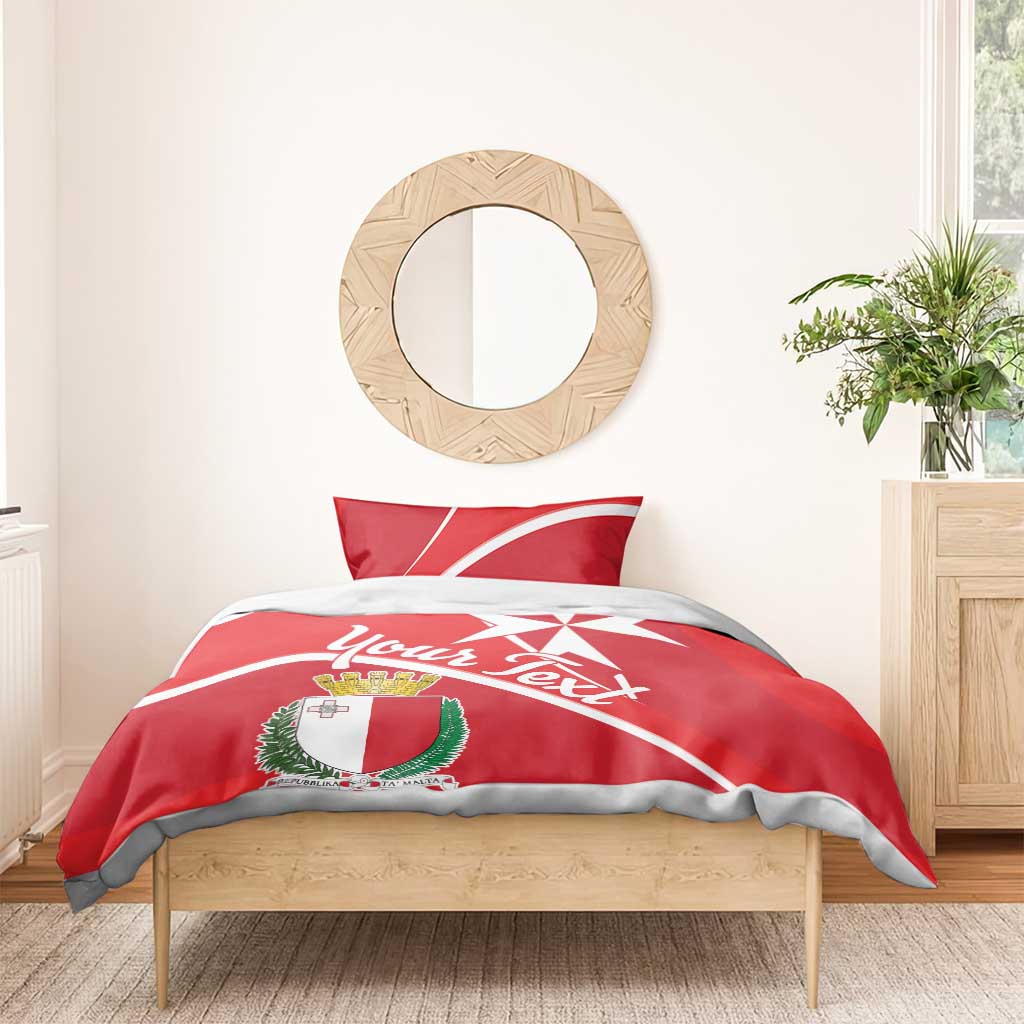 Red duvet with Malta coat of arms, white Malta cross graphic, and personalized script text