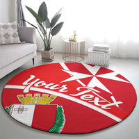 Red round carpet with white cross-star design, Maltese shield crest and “Malta”