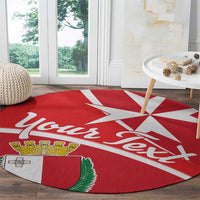 Red round carpet with “Malta” script and Maltese cross-star crest in center