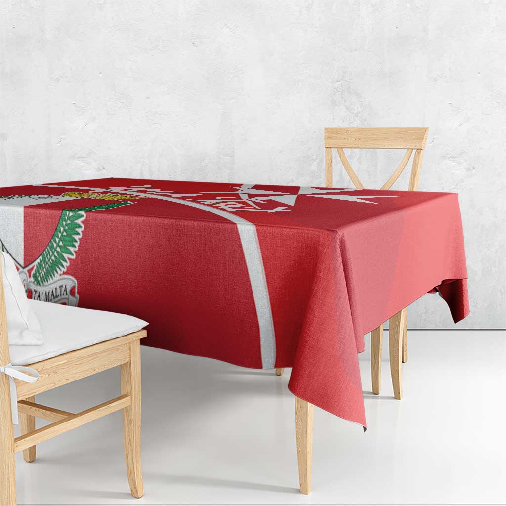 Red printed tablecloth with white Malta cross and coat of arms; drapes over dining table.
