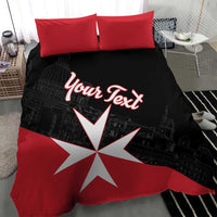 Black and red bedding set with two red pillows, white Maltese cross and 'Your Text' logo