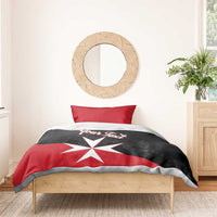 Red and black bedding set with 'Your Text' script and white Maltese cross on duvet