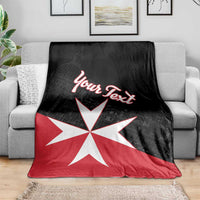 Personalized Malta cross blanket draped on sofa, black and red with white cross and “Your Text”