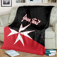 Personalized Malta cross blanket on couch, black and red with white Maltese cross and “Your Text”