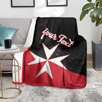 Personalized Malta cross blanket on gray couch, black/red with white cross and “Your Text”