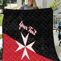 Personalized quilt blanket held up outdoors, black and red with Malta cross and “Your Text”