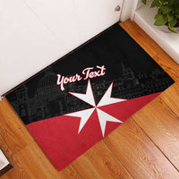 Black rubber doormat with Maltese cross and red personalized text