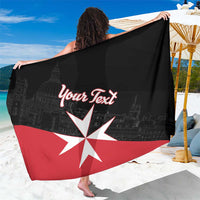 Black sarong with red-and-white Malta cross and 'Your Text' text on display