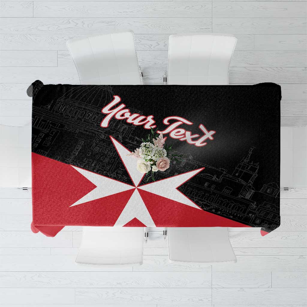 Black tablecloth with red Malta cross graphic and decorative lettering
