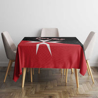 Red and black Malta cross tablecloth with centered emblem on rectangular cover