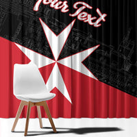 Black window curtain featuring large white Malta cross and red personalized text over red lower panel