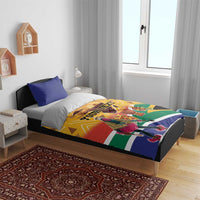 South Africa Heritage Day bedding set on a bed with blue pillows and flag-style dancer design