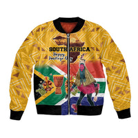 Yellow bomber jacket with black ribbed collar and zip front, printed South Africa dancer scene