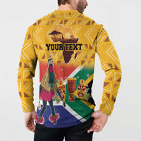 Yellow button sweatshirt back with 'YOUR TEXT' and Heritage Day dancer scene.