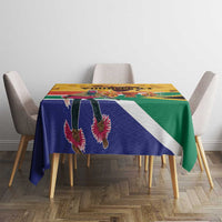 Personalized Heritage Day tablecloth on table, blue green yellow flag stripes with dancer details