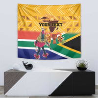 Yellow South Africa heritage tapestry with dancing figure, carved masks, and “YOUR TEXT” title.
