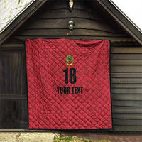 Red quilt blanket with diamond stitching, crest emblem, and “18” plus “YOUR TEXT”