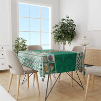 Green personalized tablecloth with Aztec-style patterns and Mexico coat of arms