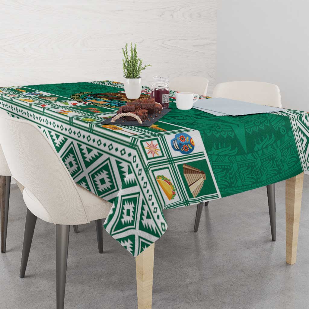 Green tablecloth with Aztec geometric border, coat of arms, and ornate icons