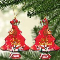 Red Christmas tree-shaped ceramic ornament with gold hanging loop; front and back labels