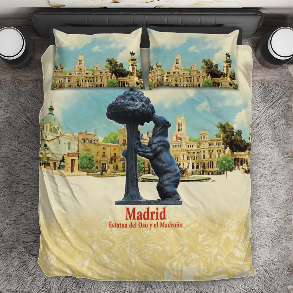 Bedding set with cream duvet and pillow featuring blue tree statue and Madrid artwork