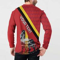 Red long-sleeve button sweatshirt back with large OUR TEXT, lion crest, flag diagonal