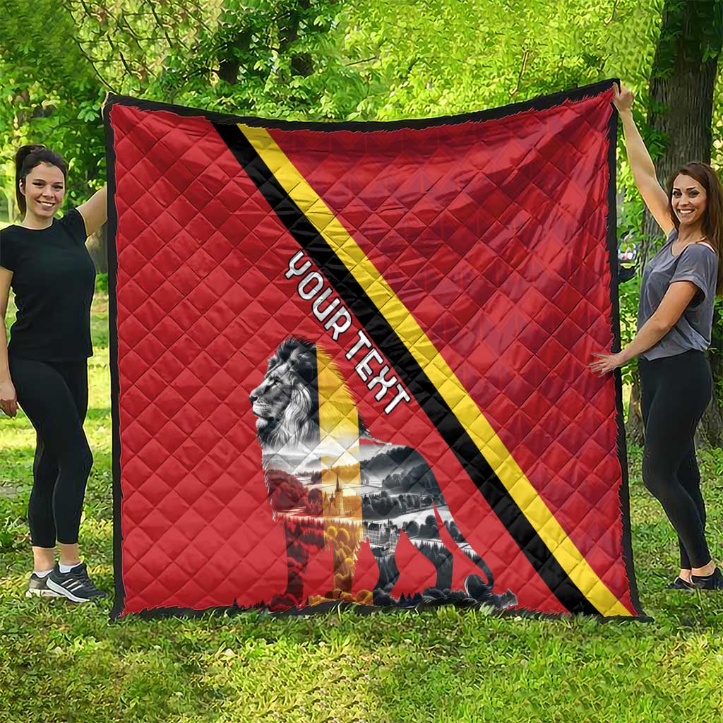 Red quilt blanket with black and yellow diagonal stripe, lion scene, and “YOUR TEXT”
