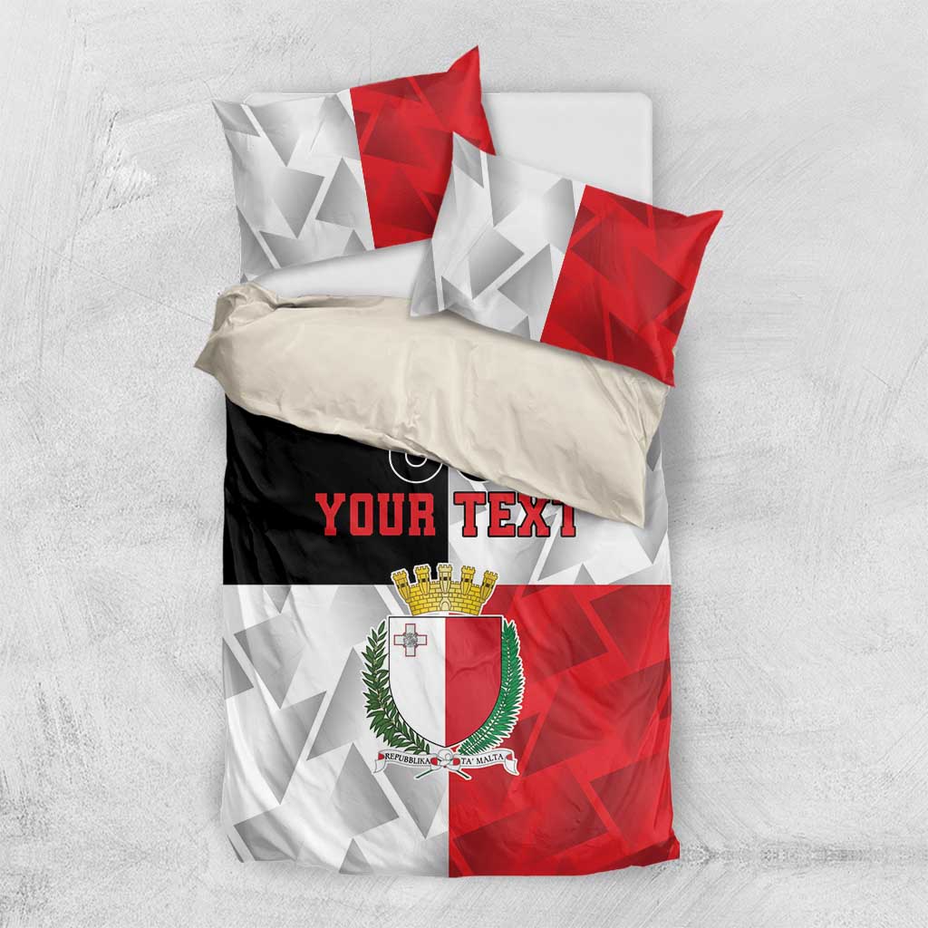 Malta bedding set laid flat with red and white geometric pattern, crest, and 'YOUR TEXT'