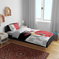 Malta bedding set on bed with red-white geometric print, crest logo, and 'YOUR TEXT'