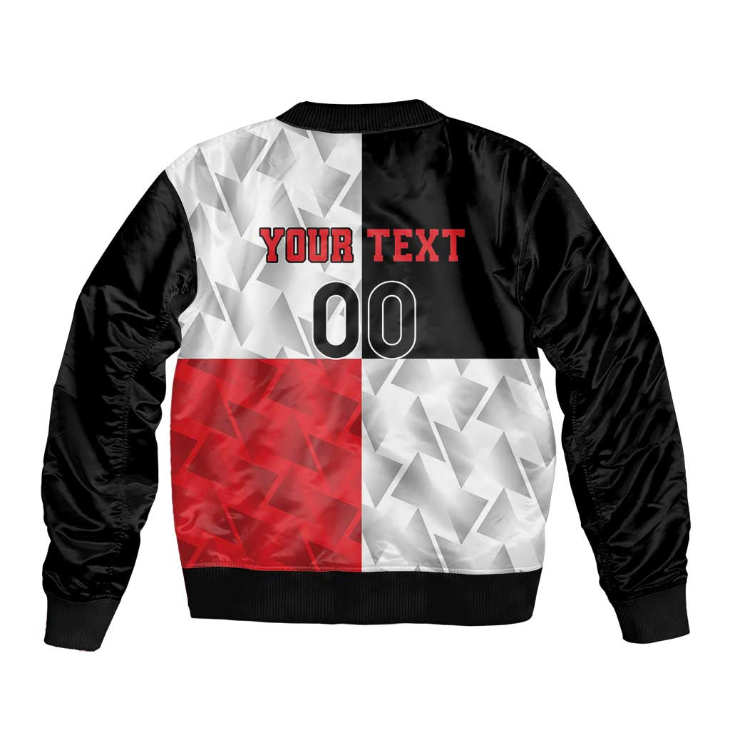 Black rugby bomber jacket back with ribbed hem, red/white geometric panels and 'YOUR TEXT 00'