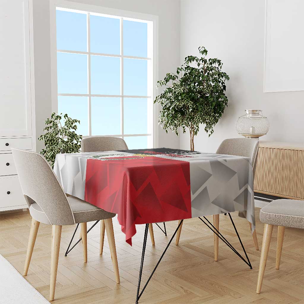Red and white custom rugby tablecloth draped on a dining table with geometric design.