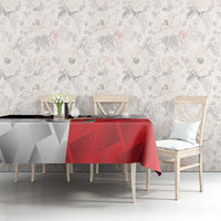 Red and white custom rugby tablecloth on dining table with geometric pattern and drape.