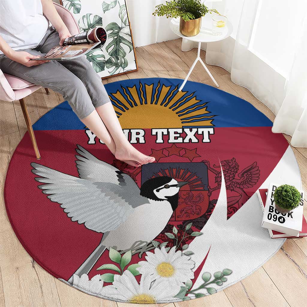 Round red-blue-white carpet with bird graphic and "YOUR TEXT" banner