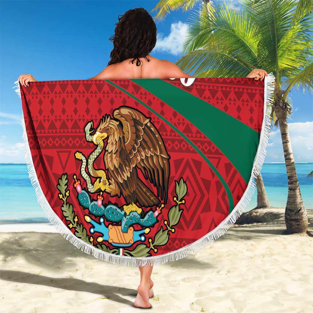 Round Mexico beach blanket, red and green folk pattern with eagle crest, fringed edge