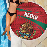 Round Mexico beach blanket with folk geometric pattern, eagle crest, white fringe