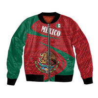 Red and green Mexico coat of arms bomber jacket, front zip, folk pattern, ribbed trim.