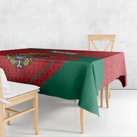 Red and green folk-pattern tablecloth with diagonal stripe and emblem motif