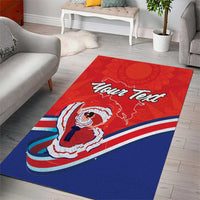 Red and blue area rug featuring folk dancer illustration with flag-style stripe edge