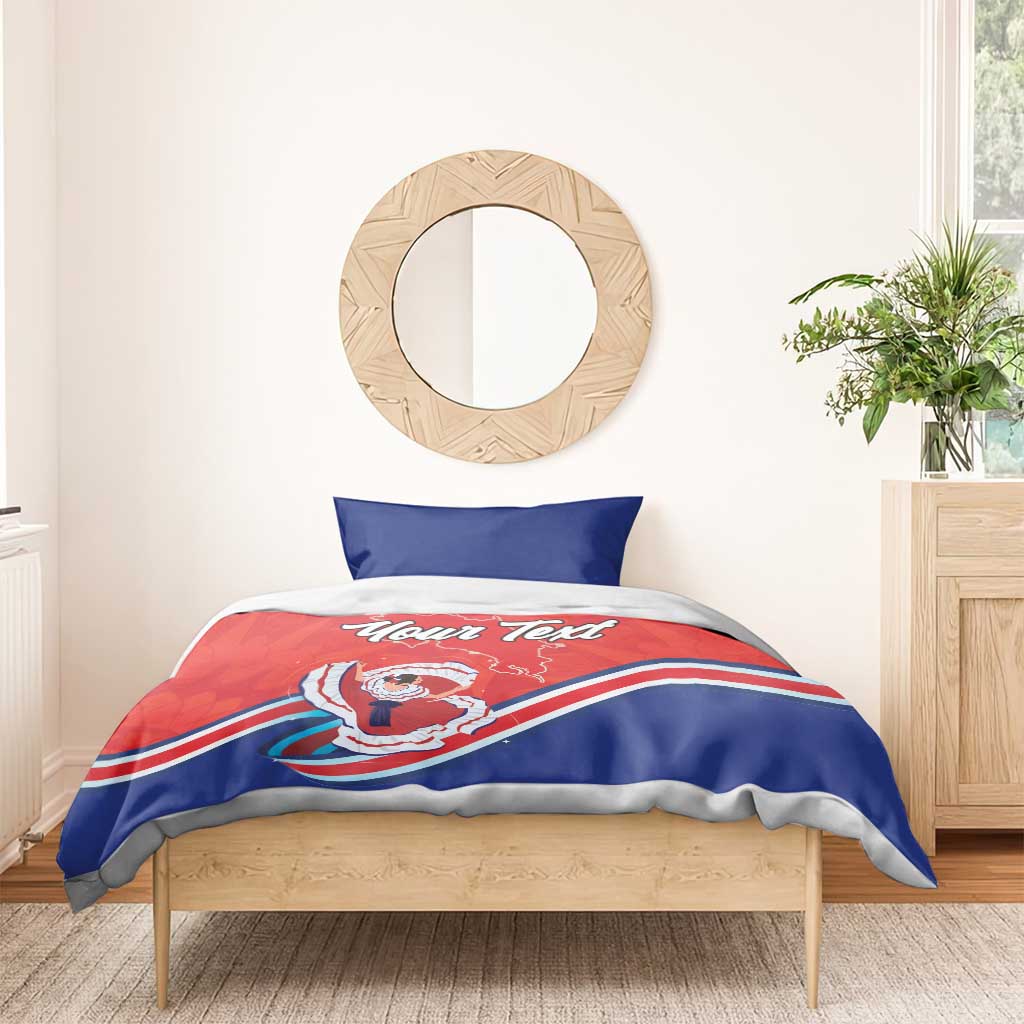 Red and blue bedding set with blue pillow; duvet has “Your Text” and Costa Rica map dancer print