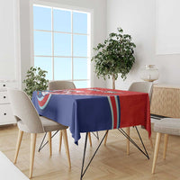 Personalized tablecloth in red and blue with folk dancer design on dining table