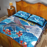 Blue sea quilt bed set with fish, red hibiscus flowers, custom text across bedspread