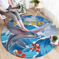 Round rug with flying fish over blue sea waves and yellow “YOUR TEXT” lettering.